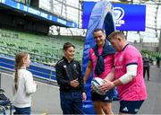 14 April 2022; Adam Reddington and his family were guests of Leinster Rugby at today’s Captain’s Run, Adam was introduced to Leinster Rugby by the Make-A-Wish charity and Adam and his family will be guests of Leinster Rugby and RTÉ at the Heineken Champions Cup game as he sees behind the scenes from a team and broadcast point of view, pictured is Tadhg Furlong and James Lowe with Tom Óg and Alannah Reddington at the Aviva Stadium in Dublin.  Photo by Harry Murphy/Sportsfile