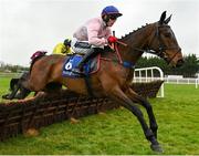 17 April 2022; Digby, with Keith Donoghue up, jumps the third on their way to winning the Cawley Furniture Novice Handicap Hurdle during day two of the Fairyhouse Easter Festival at the Fairyhouse Racecourse in Ratoath, Meath. Photo by Seb Daly/Sportsfile