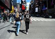 17 April 2022; Sligo supporters Rory Dillon, from Ballysadare, Sligo and Niamh Marshall, from Sligo town, in Times Square ahead of the Connacht GAA Football Senior Championship Quarter-Final match between New York and Sligo at Gaelic Park in New York, USA. Photo by Daire Brennan/Sportsfile