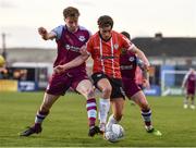 18 April 2022; Matty Smith of Derry City in action against Andrew Quinn of Drogheda United during the SSE Airtricity League Premier Division match between Drogheda United and Derry City at Head in the Game Park in Drogheda, Louth. Photo by Ben McShane/Sportsfile