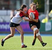 21 April 2022; Shannon Campbell of North East is tackled by Sorcha Ryan of Midlands during the Leinster Rugby Under 18 Sarah Robinson Cup Final Round match between Midlands and North East at Energia Park in Dublin. Photo by Brendan Moran/Sportsfile