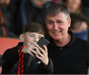 22 April 2022; Republic of Ireland manager Stephen Kenny poses for a photograph with a Bohemians supporter before the SSE Airtricity League Premier Division match between Bohemians and Shamrock Rovers at Dalymount Park in Dublin. Photo by Stephen McCarthy/Sportsfile