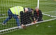 22 April 2022; The goal netting is repaired after being damaged with a flare before the SSE Airtricity League Premier Division match between Bohemians and Shamrock Rovers at Dalymount Park in Dublin. Photo by Stephen McCarthy/Sportsfile