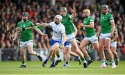 23 April 2022; Shane McNulty of Waterford in action against Limerick players, from left, Graeme Mulcahy, William O'Donoghue, Cathal O'Neill and Gearoid Hegarty during the Munster GAA Hurling Senior Championship Round 2 match between Limerick and Waterford at TUS Gaelic Grounds in Limerick. Photo by Stephen McCarthy/Sportsfile