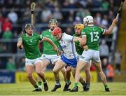 23 April 2022; Tadhg De Burca of Waterford in action against Limerick players, from left, Darragh O'Donovan, William O'Donoghue, Tom Morrisey and Aaron Gillane during the Munster GAA Hurling Senior Championship Round 2 match between Limerick and Waterford at TUS Gaelic Grounds in Limerick. Photo by Stephen McCarthy/Sportsfile