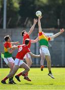 24 April 2022; Liam Brennan of Carlow in action against Conor Early of Louth during the Leinster GAA Football Senior Championship Round 1 match between Louth and Carlow at Páirc Tailteann in Navan, Meath. Photo by Eóin Noonan/Sportsfile