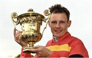 28 April 2022; Jockey Paul Townend with the trophy after winning the Ladbrokes Champion Stayers Hurdle Steeplechase on Klassical Dream during day three of the Punchestown Festival at Punchestown Racecourse in Kildare. Photo by Seb Daly/Sportsfile