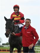 28 April 2022; Jockey Paul Townend and groom David Porter celebrate after winning the Ladbrokes Champion Stayers Hurdle Steeplechase with Klassical Dream during day three of the Punchestown Festival at Punchestown Racecourse in Kildare. Photo by Seb Daly/Sportsfile