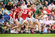 7 May 2022; David Clifford of Kerry in action against Cork players, from left, Kevin Flahive, Sean Powter and Steven Sherlock during the Munster GAA Football Senior Championship Semi-Final match between Cork and Kerry at Páirc Ui Rinn in Cork. Photo by Stephen McCarthy/Sportsfile