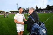 7 May 2022; Stefan Okunbor of Kerry and Dr. Con Murphy of Cork after the Munster GAA Football Senior Championship Semi-Final match between Cork and Kerry at Páirc Ui Rinn in Cork. Photo by Stephen McCarthy/Sportsfile