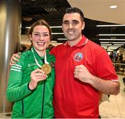 21 May 2022; Lisa O'Rourke of Ireland along with her club coach Michael Mongan of Olympic boxing club Galway at Dublin Airport on their return from the IBA Women's World Boxing Championships 2022 in Turkey. Photo by Oliver McVeigh/Sportsfile