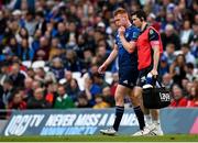 21 May 2022; Ciarán Frawley of Leinster leaves the pitch for a head injury assessment with Leinster team doctor Stuart O'Flanagan during the United Rugby Championship match between Leinster and Munster at the Aviva Stadium in Dublin. Photo by Harry Murphy/Sportsfile