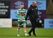 23 May 2022; Jack Byrne of Shamrock Rovers makes his way off the pitch after picking up an injury, with Shamrock Rovers physiotherapist Tony McCarthy, right, during the SSE Airtricity League Premier Division match between Drogheda United and Shamrock Rovers at Head in the Game Park in Drogheda, Louth. Photo by Ben McShane/Sportsfile