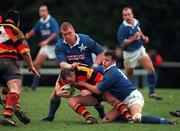 12 December 1998: Brian Glennon of Lansdowne is tackled by Victor Costello and Kelvin McNamee of St. Mary's College during the AIB All Ireland league division 1 match between St Mary's College v Lansdowne at Templeville Road in Dublin. Photo by Brendan Moran/Sportsfile