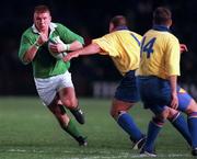 21 November 1998: Jonathan Bell of Ireland is tackled by Dragos Niculas of Romania during the World Cup Qualifing match between Ireland and Romania at Lansdowne Road in Dublin. Photo by David Maher/Sportsfile