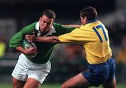 21 November 1998: Kevin Maggs of Ireland is tackled by Marius Iacob of Romania during the World Cup Qualifing match between Ireland and Romania at Lansdowne Road in Dublin. Photo by David Maher/Sportsfile