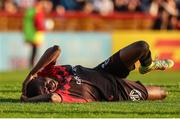 27 May 2022; Junior Ogedi-Uzokwe of Bohemians goes down injured during the SSE Airtricity League Premier Division match between Bohemians and Drogheda United at Dalymount Park in Dublin. Photo by Michael P Ryan/Sportsfile