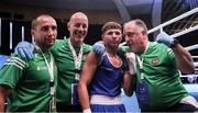 29 May 2022; James Dylan Eagleson of Ireland celebrates with his coaches after his Bantamweight Semi-Final bout against Panev Daniel Asenov of Bulgaria during the EUBC Elite Men’s European Boxing Championships at Karen Demirchyan Sports and Concerts Complex in Yerevan, Armenia. Photo by Hrach Khachatryan/Sportsfile