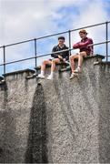 29 May 2022; Supporters look on from atop the perimeter wall before the Connacht GAA Football Senior Championship Final match between Galway and Roscommon at Pearse Stadium in Galway. Photo by Sam Barnes/Sportsfile