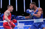 29 May 2022; Gabriel Dossen of Ireland, right, in action against Salvatore Cavallaro of Italy in their Middleweight Semi-Final bout during the EUBC Elite Men’s European Boxing Championships at Karen Demirchyan Sports and Concerts Complex in Yerevan, Armenia. Photo by Hrach Khachatryan/Sportsfile