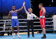 29 May 2022; Gabriel Dossen of Ireland, left is declared victorious over Salvatore Cavallaro of Italy after their Middleweight Semi-Final bout during the EUBC Elite Men’s European Boxing Championships at Karen Demirchyan Sports and Concerts Complex in Yerevan, Armenia. Photo by Hrach Khachatryan/Sportsfile