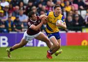 29 May 2022; Ronan Daly of Roscommon is tackled by Cillian McDaid of Galway  during the Connacht GAA Football Senior Championship Final match between Galway and Roscommon at Pearse Stadium in Galway. Photo by Eóin Noonan/Sportsfile