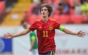 3 June 2022; Bryan Gil of Spain celebrates after scoring his side's third goal during the UEFA European U21 Championship Qualifier match between Northern Ireland and Spain at Inver Park in Larne, Antrim. Photo by Ramsey Cardy/Sportsfile