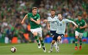 11 June 2022; Nathan Collins of Republic of Ireland in action against Callum McGregor of Scotland during the UEFA Nations League B group 1 match between Republic of Ireland and Scotland at the Aviva Stadium in Dublin. Photo by Seb Daly/Sportsfile