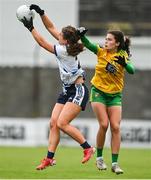 11 June 2022; Rebecca Casey of Waterford in action against Amy Boyle Carr of Donegal during the TG4 All-Ireland Ladies Football Senior Championship Group D - Round 1 match between Donegal and Waterford at St Brendan's Park in Birr, Offaly. Photo by Sam Barnes/Sportsfile