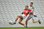 12 June 2022; Brian Hurley of Cork is tackled by Brian Fanning of Limerick during the GAA Football All-Ireland Senior Championship Round 2 match between between Cork and Limerick at Páirc Ui Chaoimh in Cork. Photo by Eóin Noonan/Sportsfile