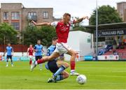 17 June 2022; Sam Curtis of St Patrick's Athletic is tackled by Donal Higgins of UCD during the SSE Airtricity League Premier Division match between St Patrick's Athletic and UCD at Richmond Park in Dublin. Photo by Michael P Ryan/Sportsfile