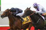 25 June 2022; Wexford Native, with Kevin Manning up, on their way to winning The Dubai Duty Free Celebration Stakes from second place The Acropolis,8, with Ryan Moore during the Dubai Duty Free Irish Derby Festival at The Curragh Racecourse in Kildare. Photo by Matt Browne/Sportsfile