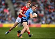 25 June 2022; Paddy Small of Dublin in action against Paul Ring of Cork during the GAA Football All-Ireland Senior Championship Quarter-Final match between Dublin and Cork at Croke Park, Dublin. Photo by David Fitzgerald/Sportsfile