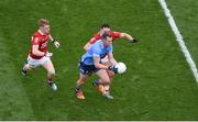 25 June 2022; Dean Rock of Dublin in action against Paul Ring, left, and Seán Powter of Cork during the GAA Football All-Ireland Senior Championship Quarter-Final match between Dublin and Cork at Croke Park, Dublin. Photo by Daire Brennan/Sportsfile