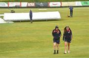 26 June 2022; Dragons players after inspecting the ground before the Cricket Ireland Inter-Provincial Trophy match between Dragons and Typhoons at Waringstown Cricket Club in Craigavon, Armagh. Photo by Oliver McVeigh/Sportsfile