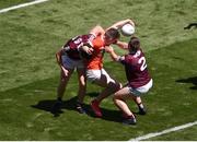26 June 2022; Jarly Óg Burns of Armagh in action against Kieran Molloy, left, and Liam Silke of Galway during the GAA Football All-Ireland Senior Championship Quarter-Final match between Armagh and Galway at Croke Park, Dublin. Photo by Daire Brennan/Sportsfile