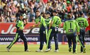 28 June 2022; Mark Adair of Ireland, centre, celebrates with team-mates after bowling Sanju Samson of India during the LevelUp11 Second Men's T20 International match between Ireland and India at Malahide Cricket Club in Dublin. Photo by Sam Barnes/Sportsfile