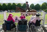 8 August 2013; Spectators, from left, Margret Dunne, Theresa Crotty and Elizebeth Duggan look on at the Light Weight Hunters competition. Discover Ireland Dublin Horse Show 2013, RDS, Ballsbridge, Dublin. Picture credit: Barry Cregg / SPORTSFILE