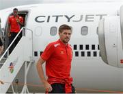 9 August 2013; Liverpool captain Steven Gerrard on the team's arrival in Dublin Airport ahead of the Dublin Decider against Glasgow Celtic on Saturday. Dublin Airport, Dublin. Picture credit: Brendan Moran / SPORTSFILE