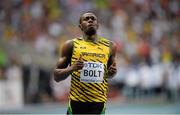 10 August 2013; Jamaica's Usain Bolt wins his heat of the men's 100m event, in a time of 10.07. IAAF World Athletics Championships - Day 1. Luzhniki Stadium, Moscow, Russia. Picture credit: Stephen McCarthy / SPORTSFILE