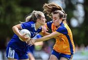 10 July 2022; Aimee Kelly of Laois in action against Gráinne Nolan of Clare during the TG4 All-Ireland Ladies Football Intermediate Championship Semi-Final match between Clare and Laois at St Brigid’s GAA club in Kiltoom, Roscommon. Photo by David Fitzgerald/Sportsfile