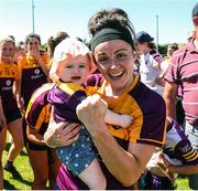 10 July 2022; Catriona Murray of Wexford celebrates Doireann Fitzgearld, age 10 months, after the TG4 All-Ireland Ladies Football Intermediate Championship Semi-Final match between Roscommon and Wexford at Crettyard GAA club, Crettyard, Laois. Photo by Michael P Ryan/Sportsfile