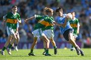 10 July 2022; Michael Redmond, Kildavin N.S., Kildavin, Carlow, representing Dublin, is tackled by Cathal Ivors, Slieveardagh, The Commons, Thurles, Tipperary, representing Kerry, during the INTO Cumann na mBunscol GAA Respect Exhibition Go Games at the GAA Football All-Ireland Senior Championship Semi-Final match between Dublin and Kerry at Croke Park in Dublin. Photo by Ramsey Cardy/Sportsfile