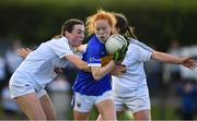 13 July 2022; Ciara Shelly of Tipperary in action against Niamh Murphy of Kildare, left, and Zara Hurley during the 2022 All-Ireland U16 B Final between Kildare and Tipperary at Crettyard, Co. Laois. Photo by Ray McManus/Sportsfile