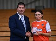 13 July 2022; Lucy Doyle of Armagh receives the player of the match award from Mícheál Naughton, LGFA President, following the 2022 All-Ireland U16 C Final between Armagh and Longford at Lisnaskea Emmetts, Co. Fermanagh. Photo by Piaras Ó Mídheach/Sportsfile