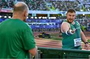 15 July 2022; John Kelly of Ireland speaks to his coach while competing in the men's Shot Put qualification during day one of the World Athletics Championships at Hayward Field in Eugene, Oregon, USA. Photo by Sam Barnes/Sportsfile
