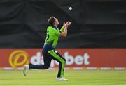 18 July 2022; Mark Adair of Ireland catches the wicket of Ish Sodhi of New Zealand during the Men's T20 International match between Ireland and New Zealand at Stormont in Belfast. Photo by Ramsey Cardy/Sportsfile