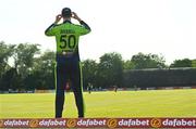 18 July 2022; George Dockrell of Ireland during the Men's T20 International match between Ireland and New Zealand at Stormont in Belfast. Photo by Ramsey Cardy/Sportsfile