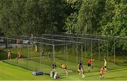 18 July 2022; Young spectators practice their skills during a break in play during the Men's T20 International match between Ireland and New Zealand at Stormont in Belfast. Photo by Ramsey Cardy/Sportsfile