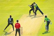 18 July 2022; George Dockrell of Ireland hits a four during the Men's T20 International match between Ireland and New Zealand at Stormont in Belfast. Photo by Ramsey Cardy/Sportsfile